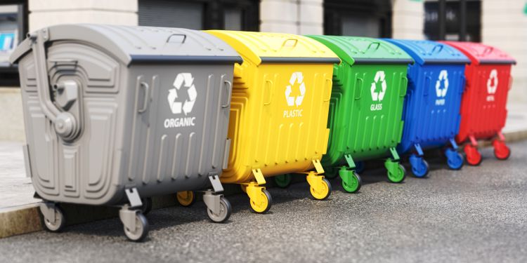 Garbage containers with separated garbage on a street. 3D illustration of grey, yellow, green, blue, and red bins for plastic, glass, paper, and organic waste.